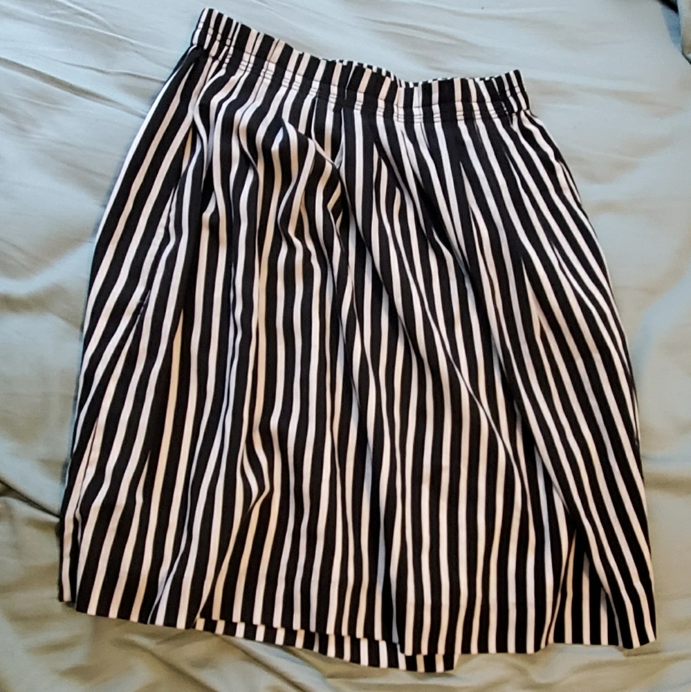 Black and whites stripes skirt.
